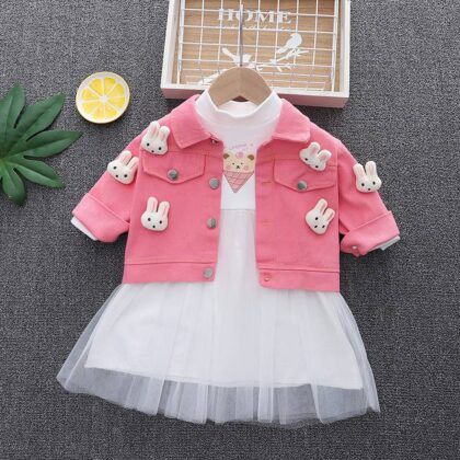 White gown and pink jacket